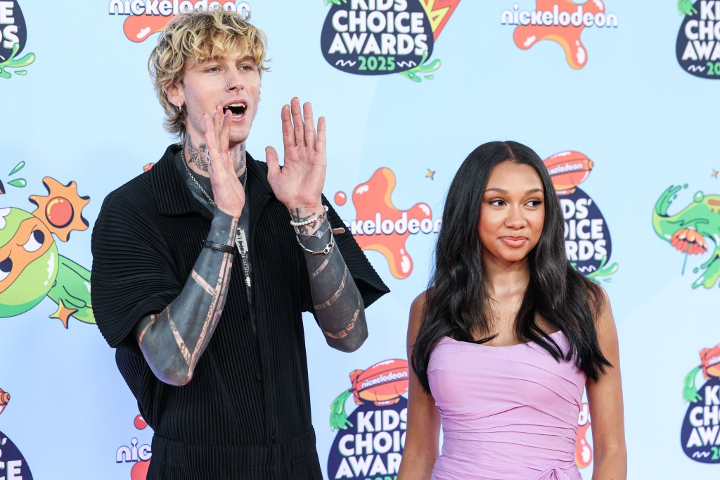 Happy moment between MGK and Casie at the Kids' Choice Awards.