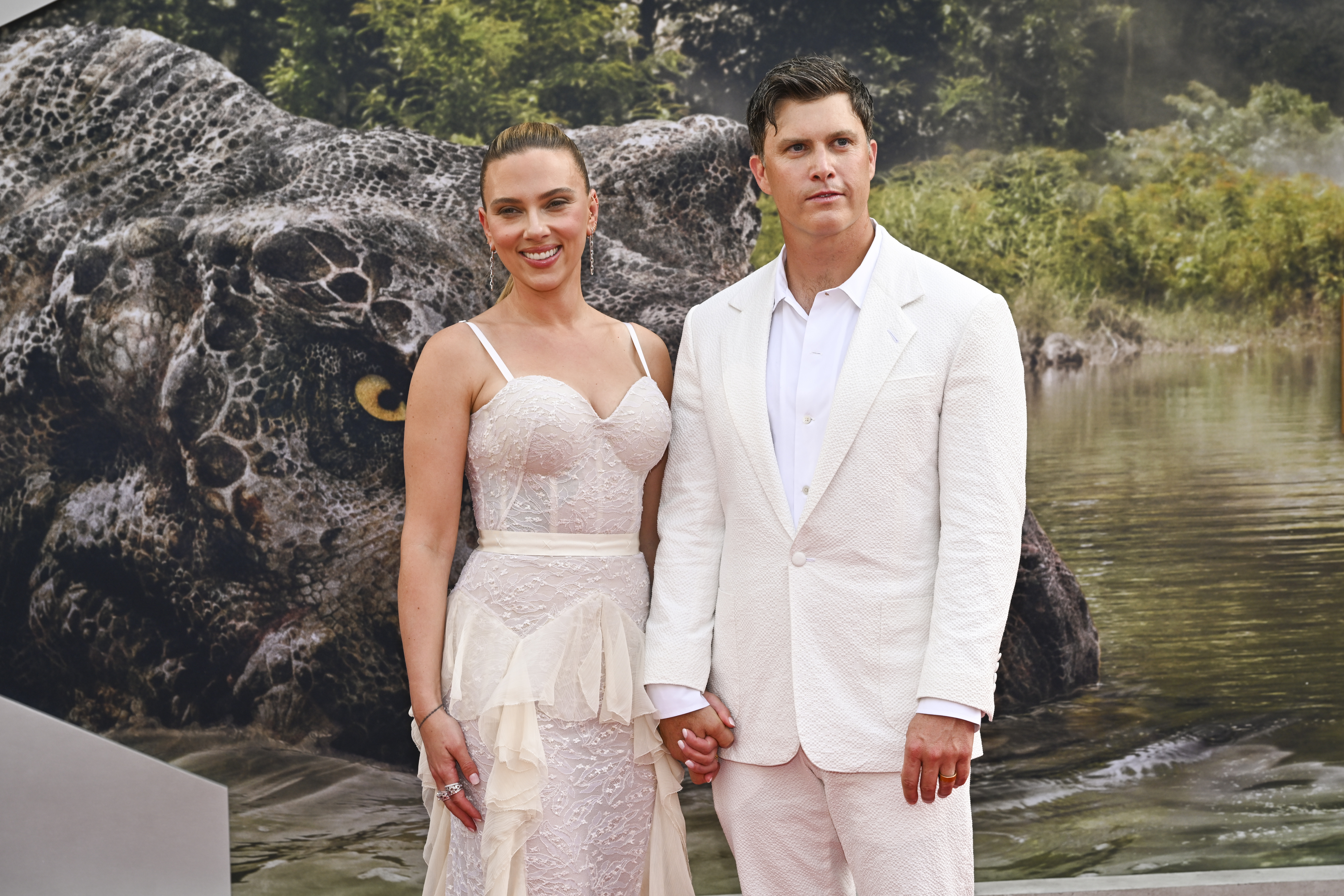 Colin Jost and Scarlett Johansson on the red carpet.