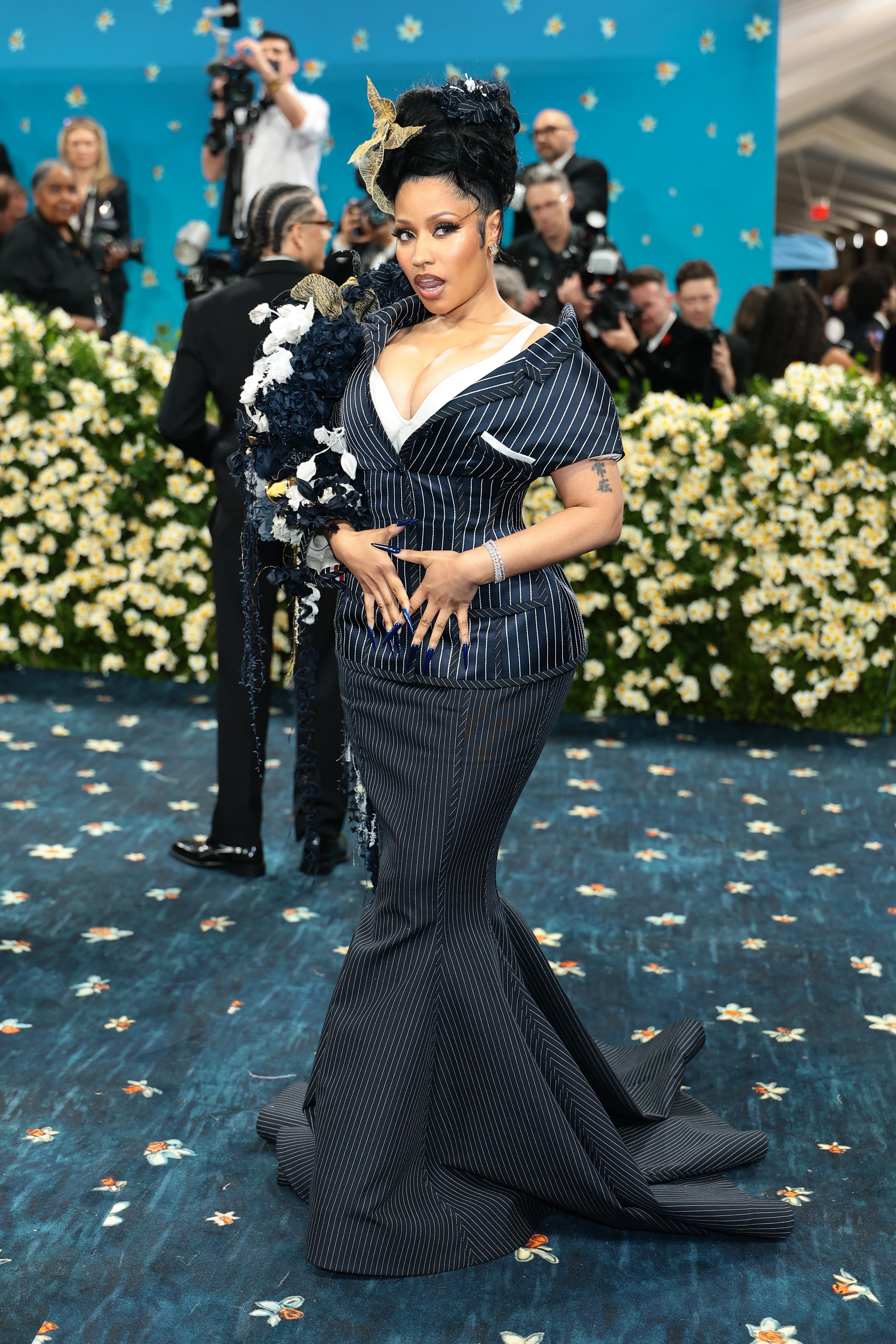 Rihanna debuted her growing baby bump on the Met Gala red carpet
