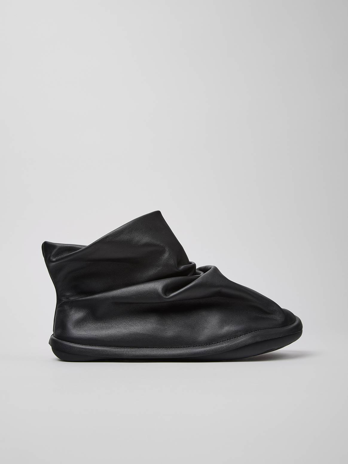 Camper x Issey Miyake capsule collection. Camper x Issey Miyake capsule collection.