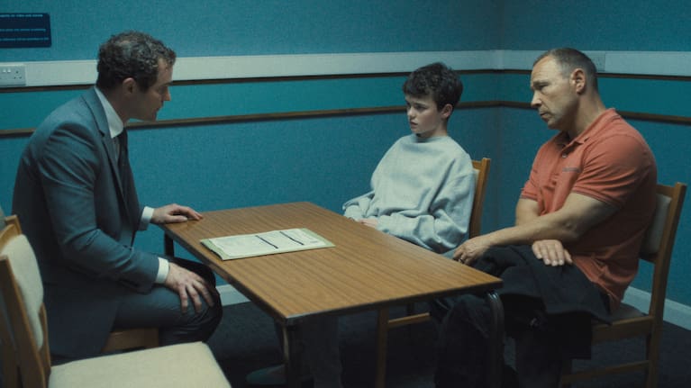 This image released by Netflix shows Mark Stanley, Owen Cooper, and Stephen Graham in a scene from Adolescence.