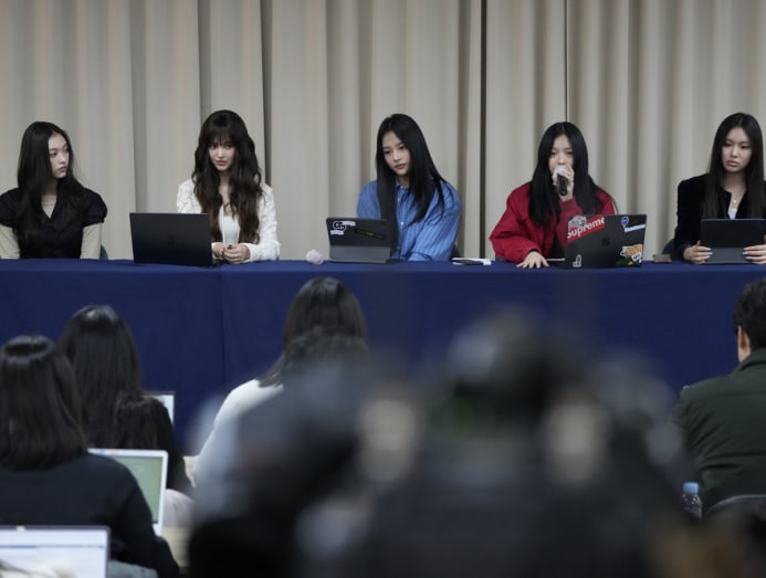 Members of NewJeans attend a press conference in Seoul, South Korea