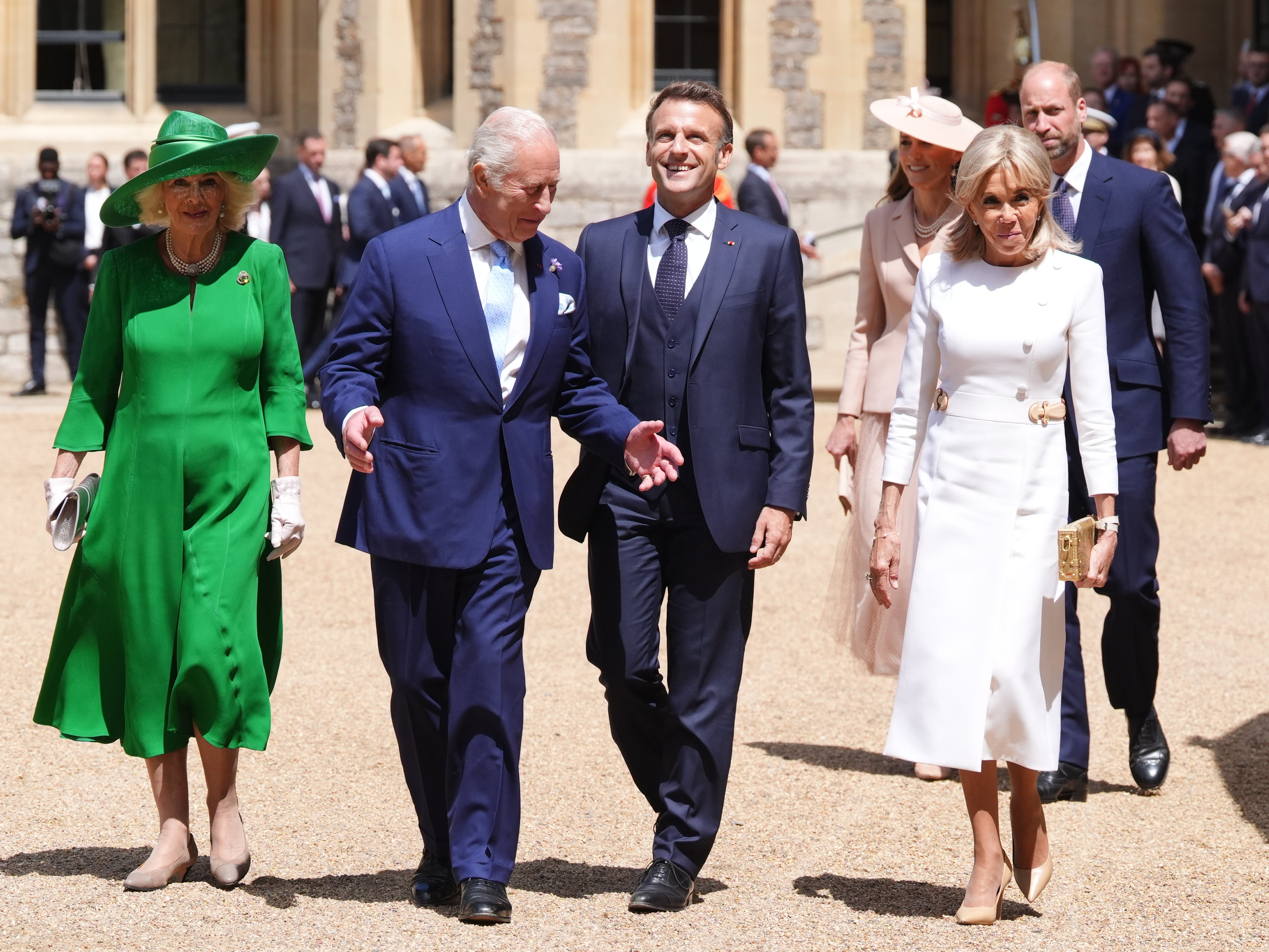 The Queen, the King, President of France Emmanuel Macron and his wife Brigitte Macron at the ceremonial welcome for his state visit to the UK at Windsor Castle