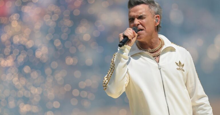 Robbie Williams Unveils New Album with Powerful Single "Spies"