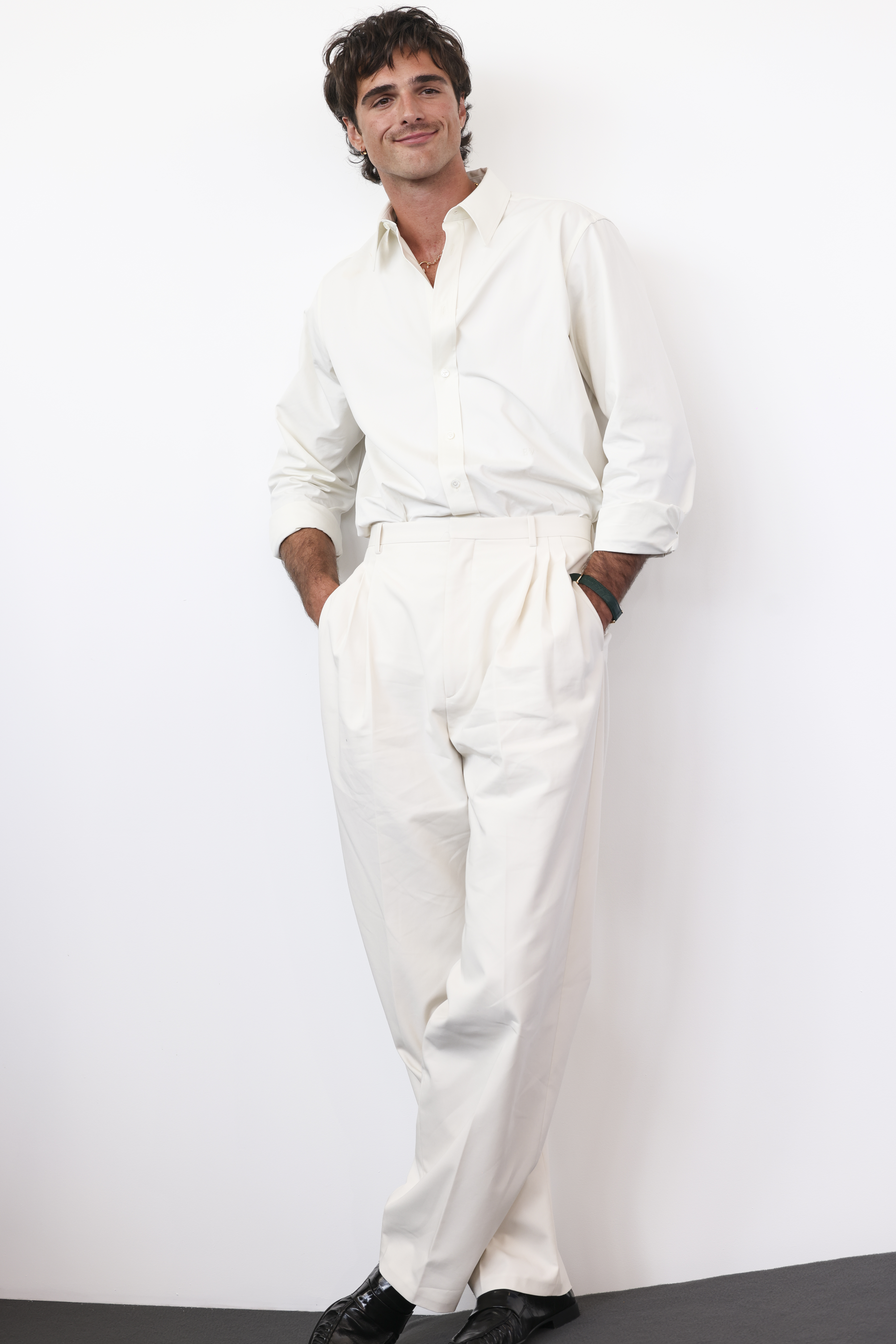 Jacob Elordi in a stylish white outfit.