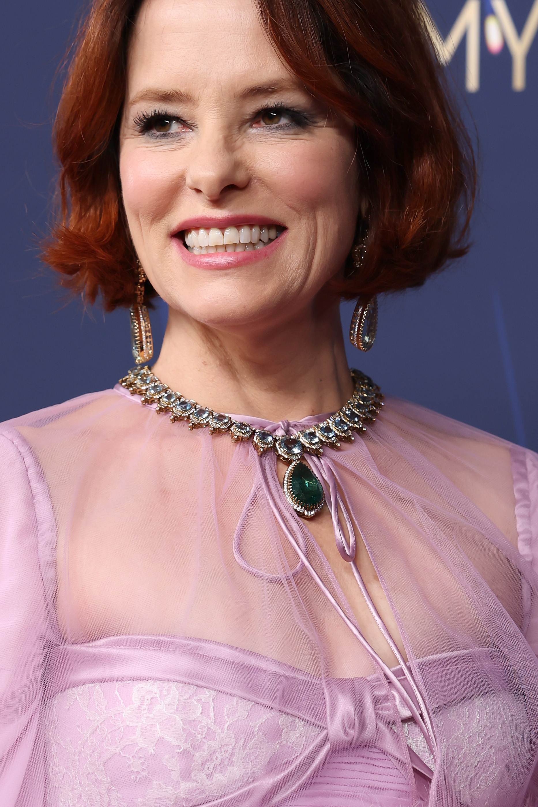 Detail of Parker Posey's necklace