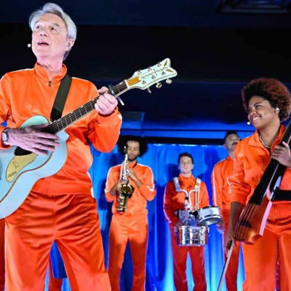 David Byrne Dazzles in Orange Tracksuits on ‘Fallon’ with 'What Is The Reason?'