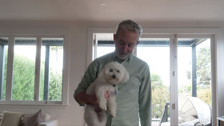 Nigel with his beloved dog.