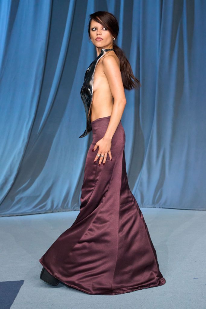 Jenna Ortega posing at the Academy Gala at the Academy Museum of Motion Pictures.