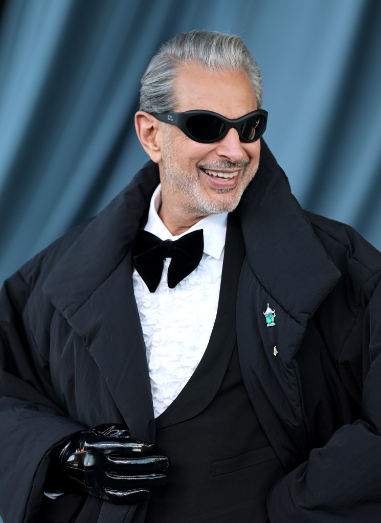 Jeff Goldblum showcasing a stylish puffer jacket over a tuxedo at the gala.