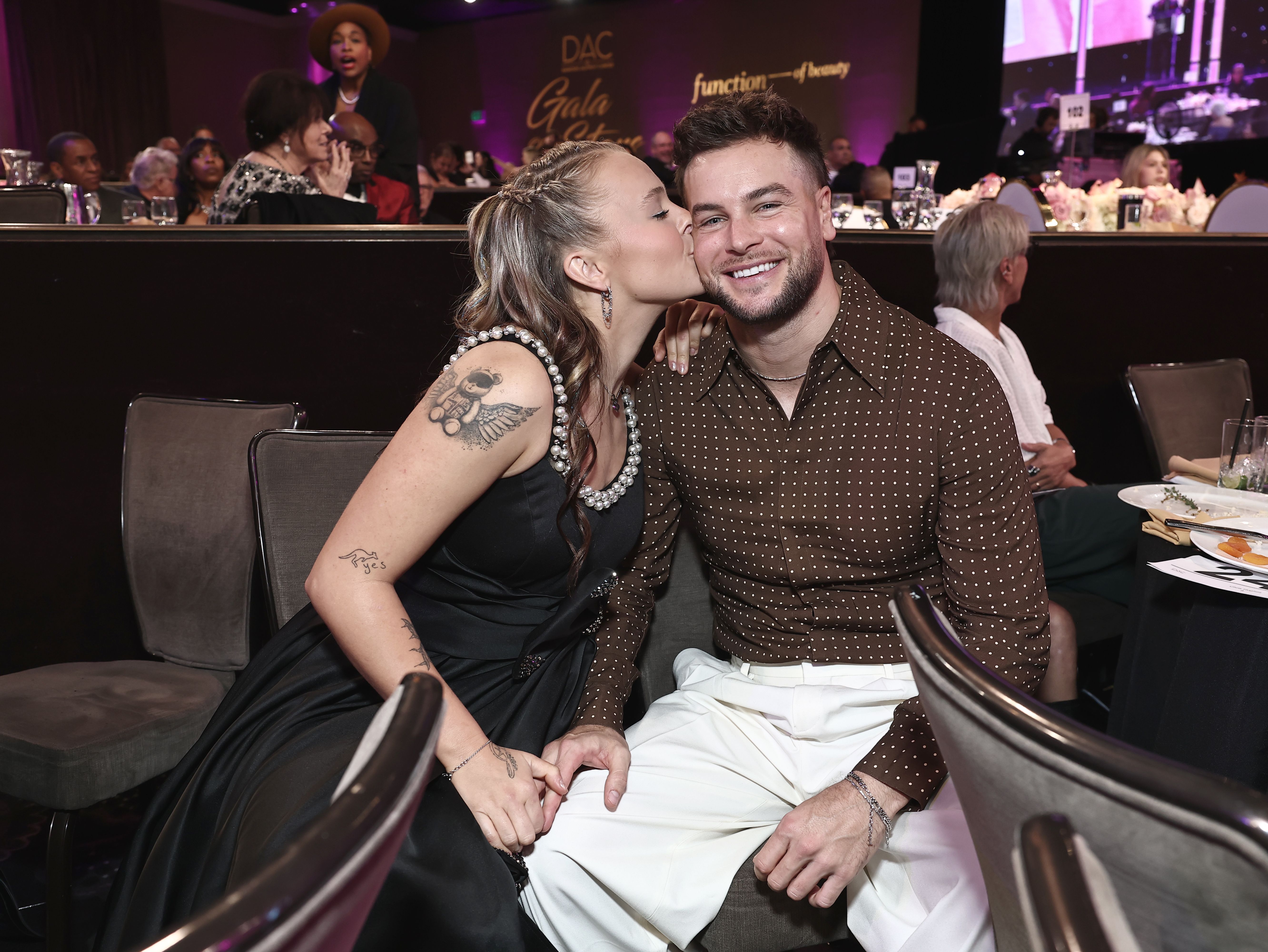 JoJo Siwa kissing Chris Hughes at the Gala.