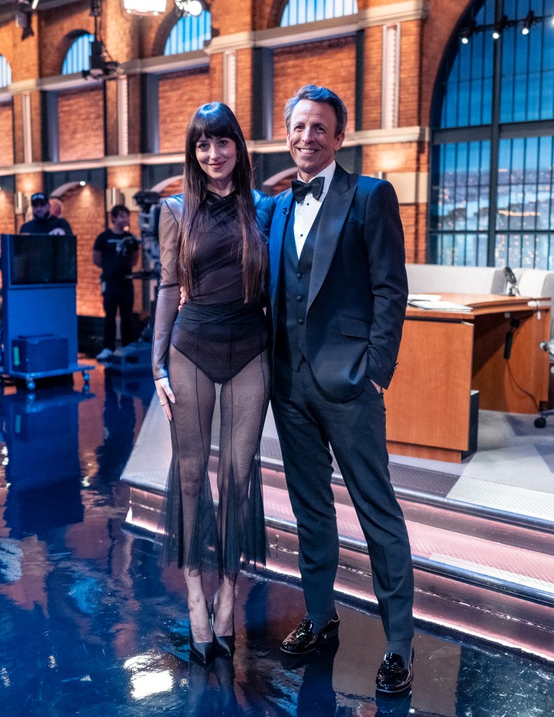 Actress Dakota Johnson and host Seth Meyers on the set of "Late Night with Seth Meyers."