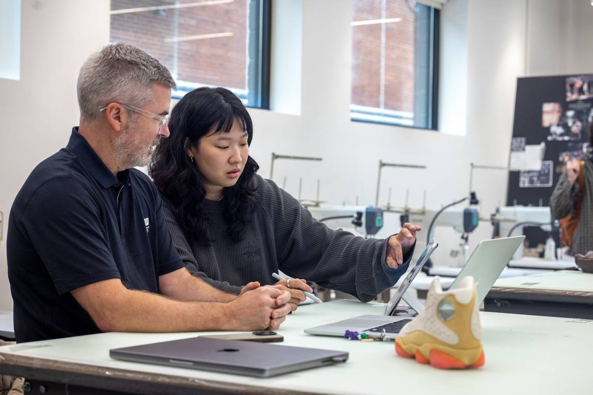 Tate Kuerbis with a student during SCAD Sneaker Culture Week 2025.