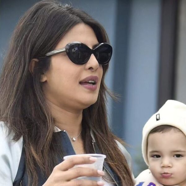 Priyanka Chopra Keeps Malti Close During Nick Jonas' Performance