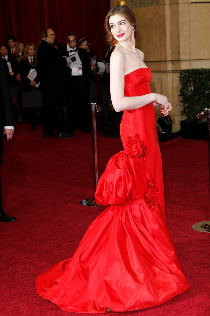 Anne Hathaway stunning in a vintage Valentino gown at the 83rd Academy Awards.