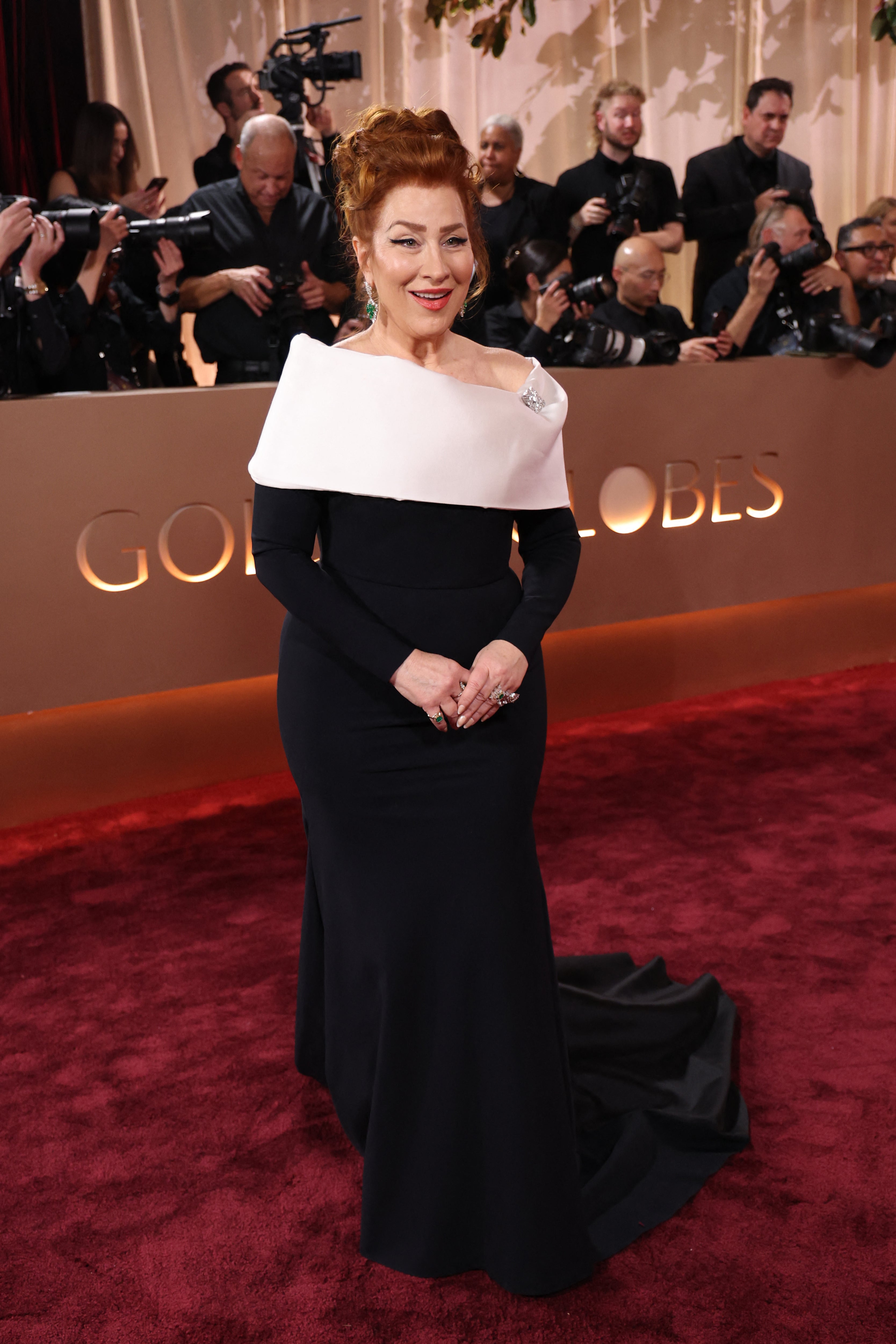Lisa Ann Walter in a black and white gown